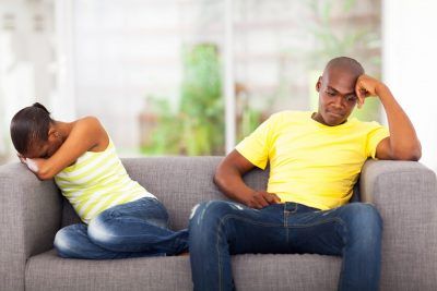 an African American couple fighting