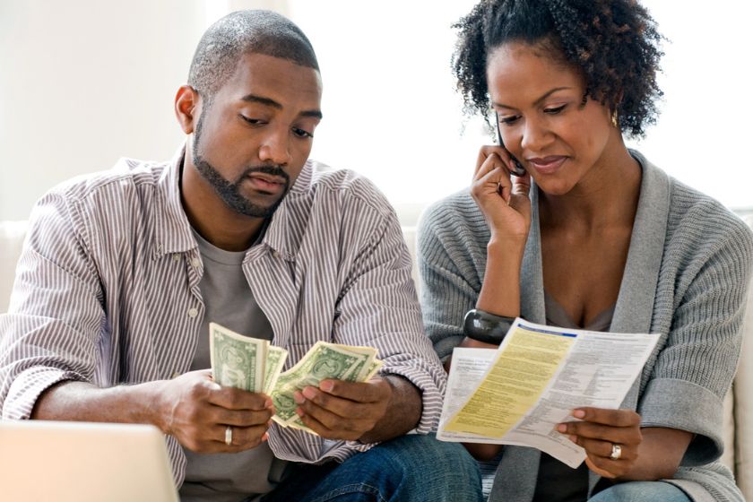 A black couple worried about their finances