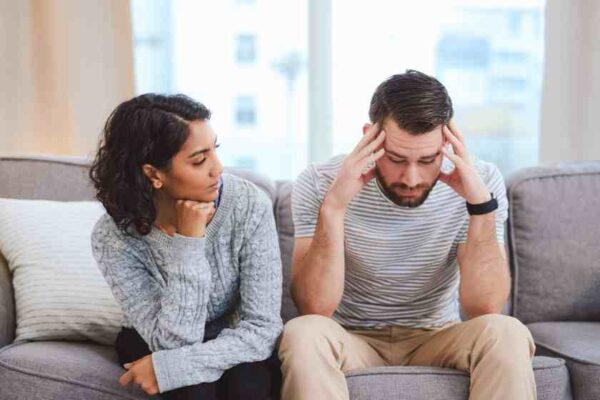 A man ignoring his woman at home in a relationship