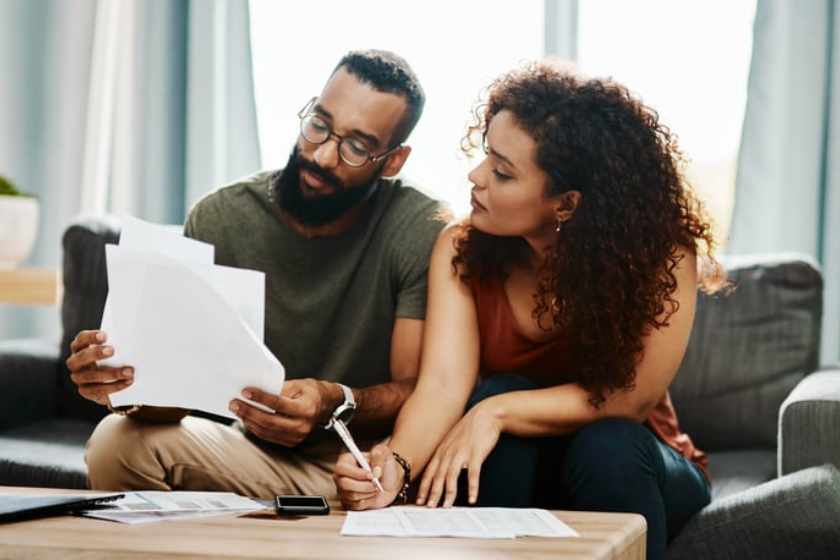 A couple sorting out their family bills and finances