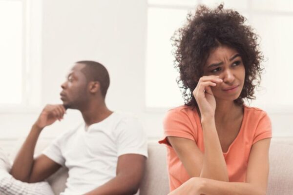 A sad African American couple