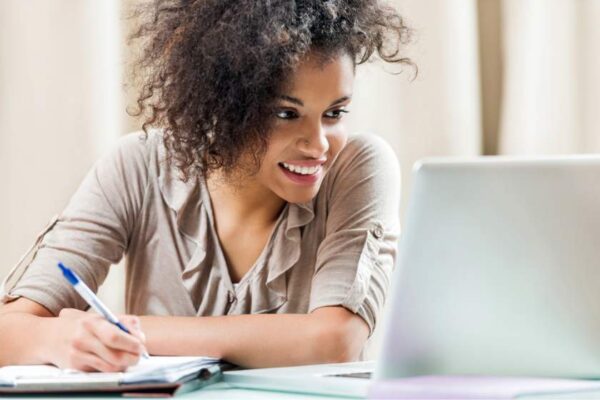 A female student studying online