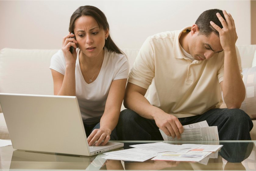 A couple lamenting about having debt and not having money