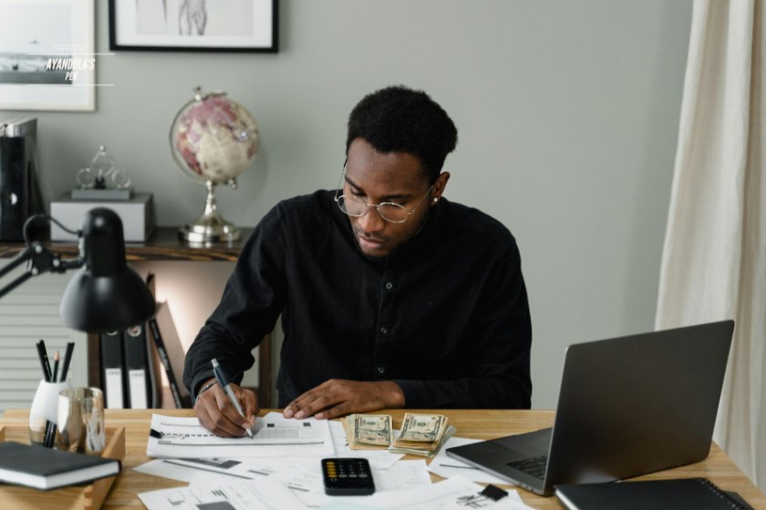 Black man working on his finances and changing his money mindset