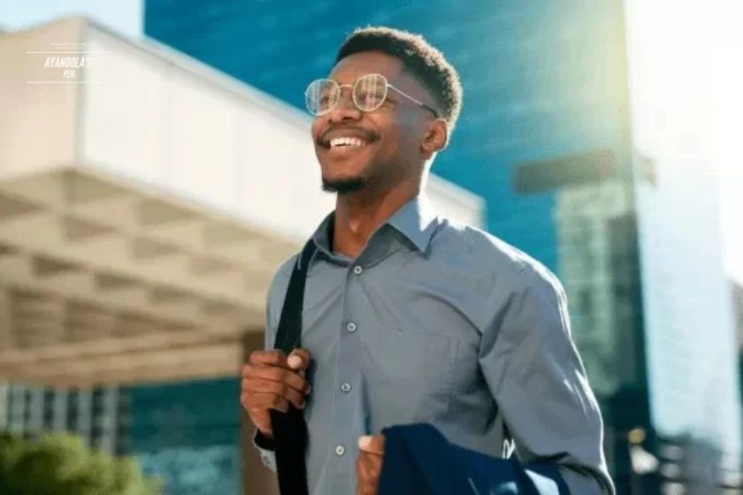 black office worker looking to the sky - find the career you love